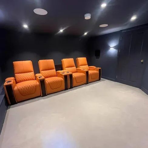 Home cinema room basement conversion Leeds home cinema room basement conversion Roundhay Park Leeds with leather seating and recessed lighting